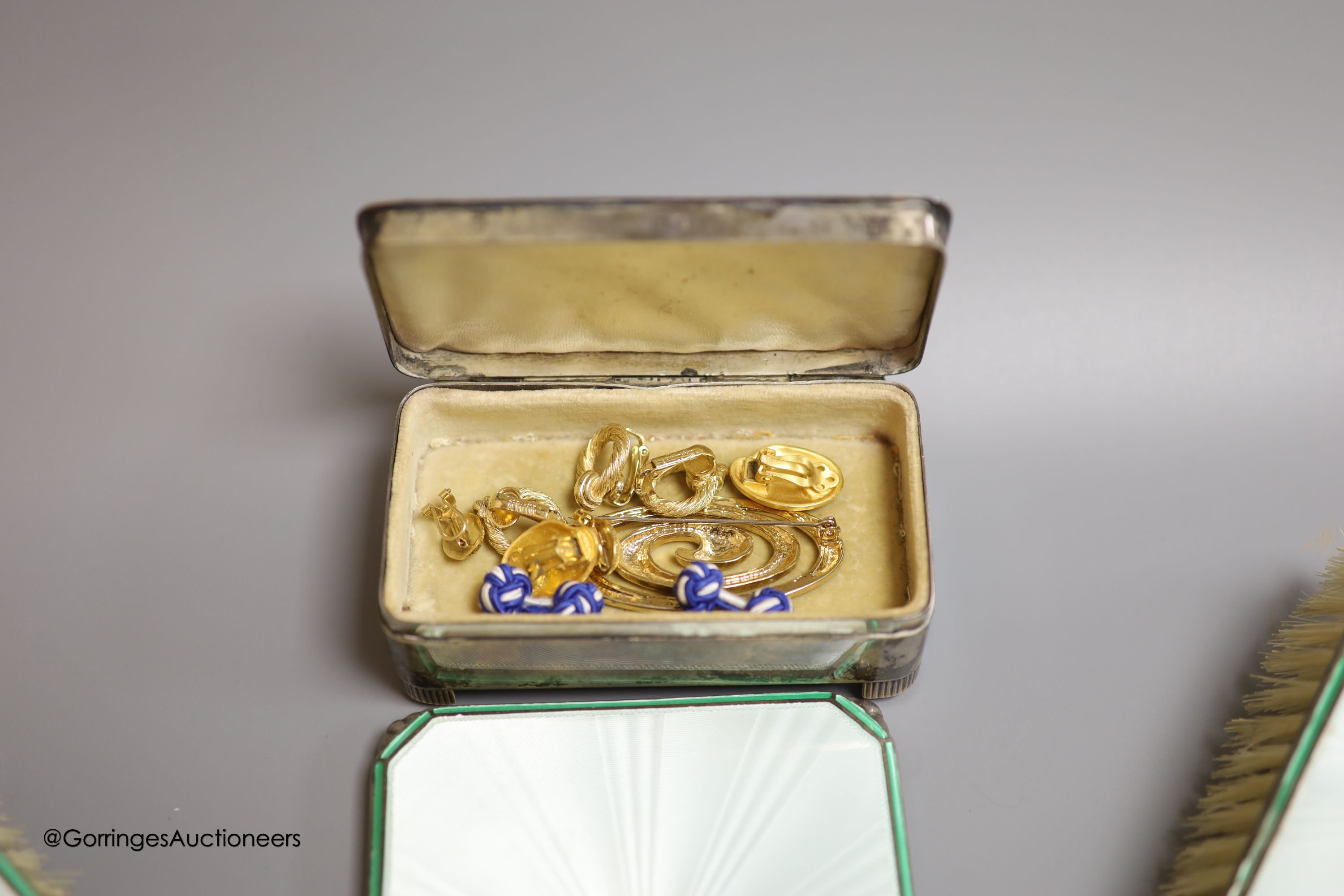 A 1930's Art Deco six-piece silver, enamel, marcasite and jade set dressing set, including a rectangular trinket box(a.f.) 10.5cm, Adie Brothers, Birmingham, 1936.